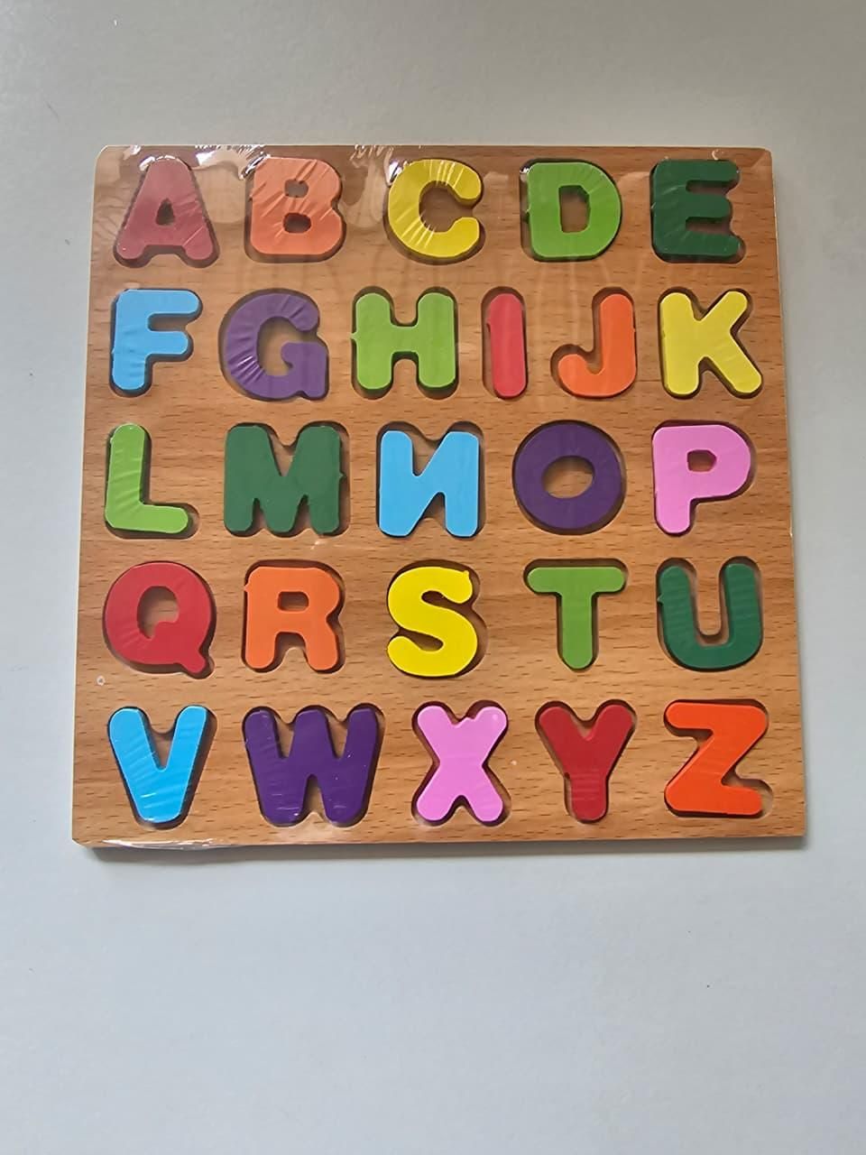 Colorful 4-in-1 wooden puzzle by minibelly-dev featuring interlocking pieces and educational design for kids.