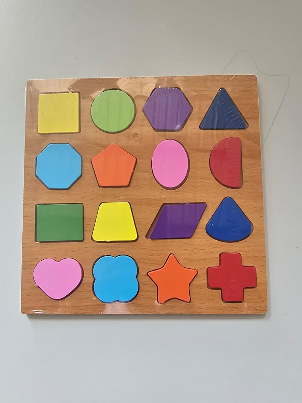 Colorful 4 in 1 wooden puzzle by minibelly-dev featuring interlocking pieces and educational design for kids.