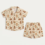 MiniBelly kids' co-ord set with a half shirt and pants featuring cute brown bears and green leaves on light fabric, 0-6 months.