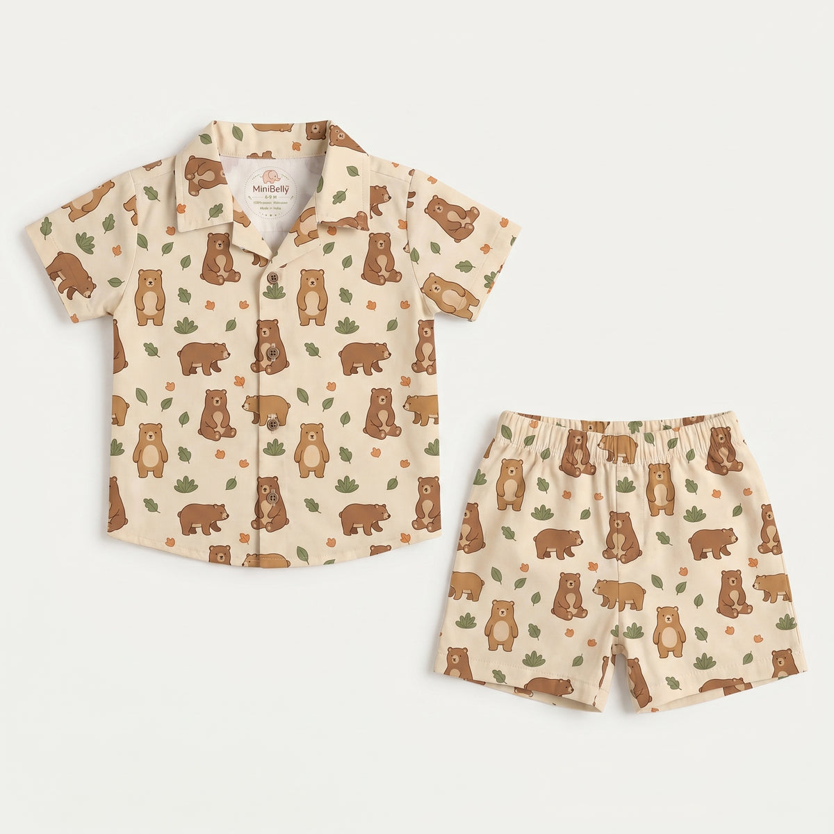 MiniBelly kids' co-ord set with a half shirt and pants featuring cute brown bears and green leaves on light fabric, 0-6 months.