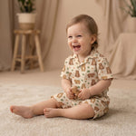 MiniBelly kids' co-ord set with half shirt and pants featuring cute brown bears and green leaves on light cotton fabric.