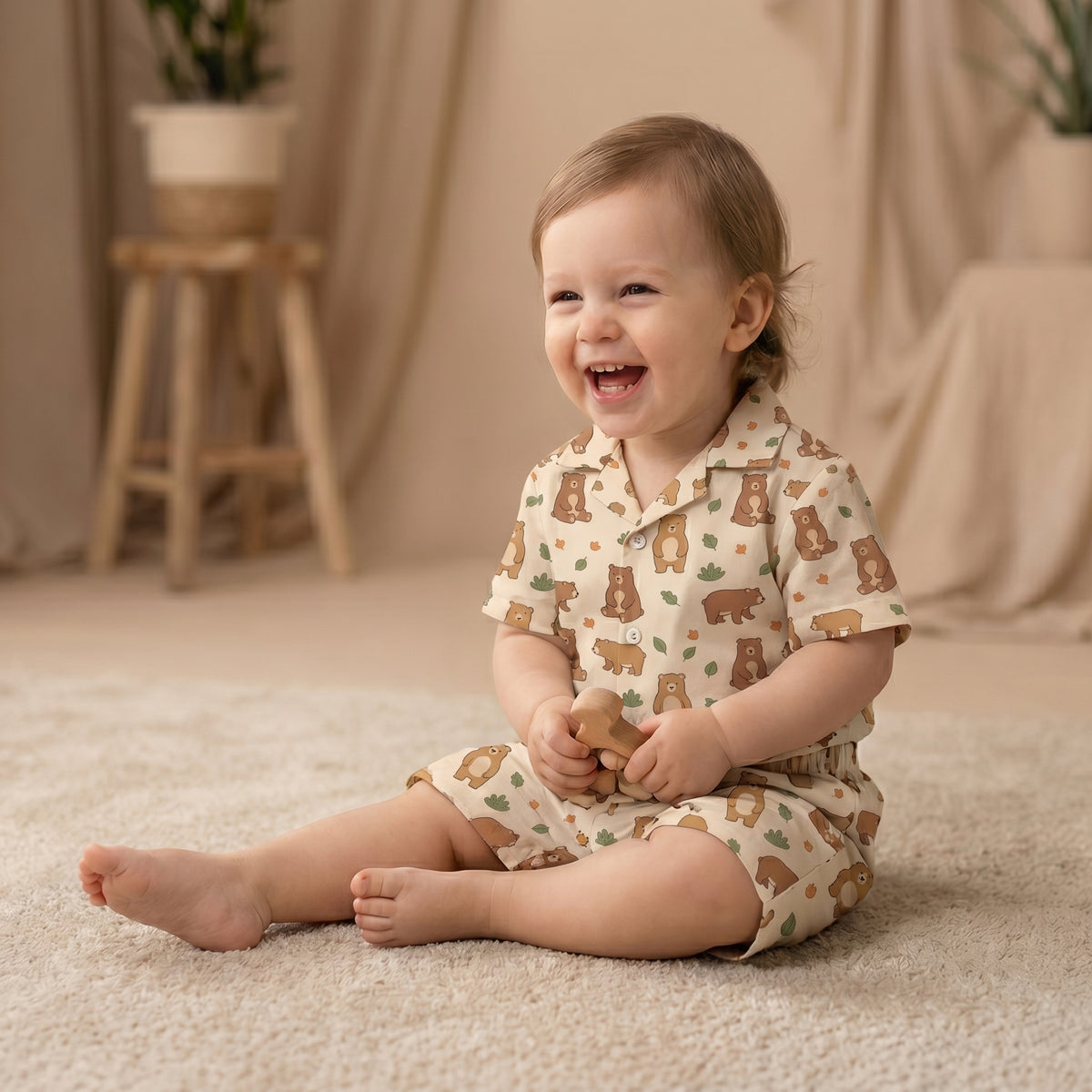 MiniBelly kids' co-ord set with half shirt and pants featuring cute brown bears and green leaves on light cotton fabric.