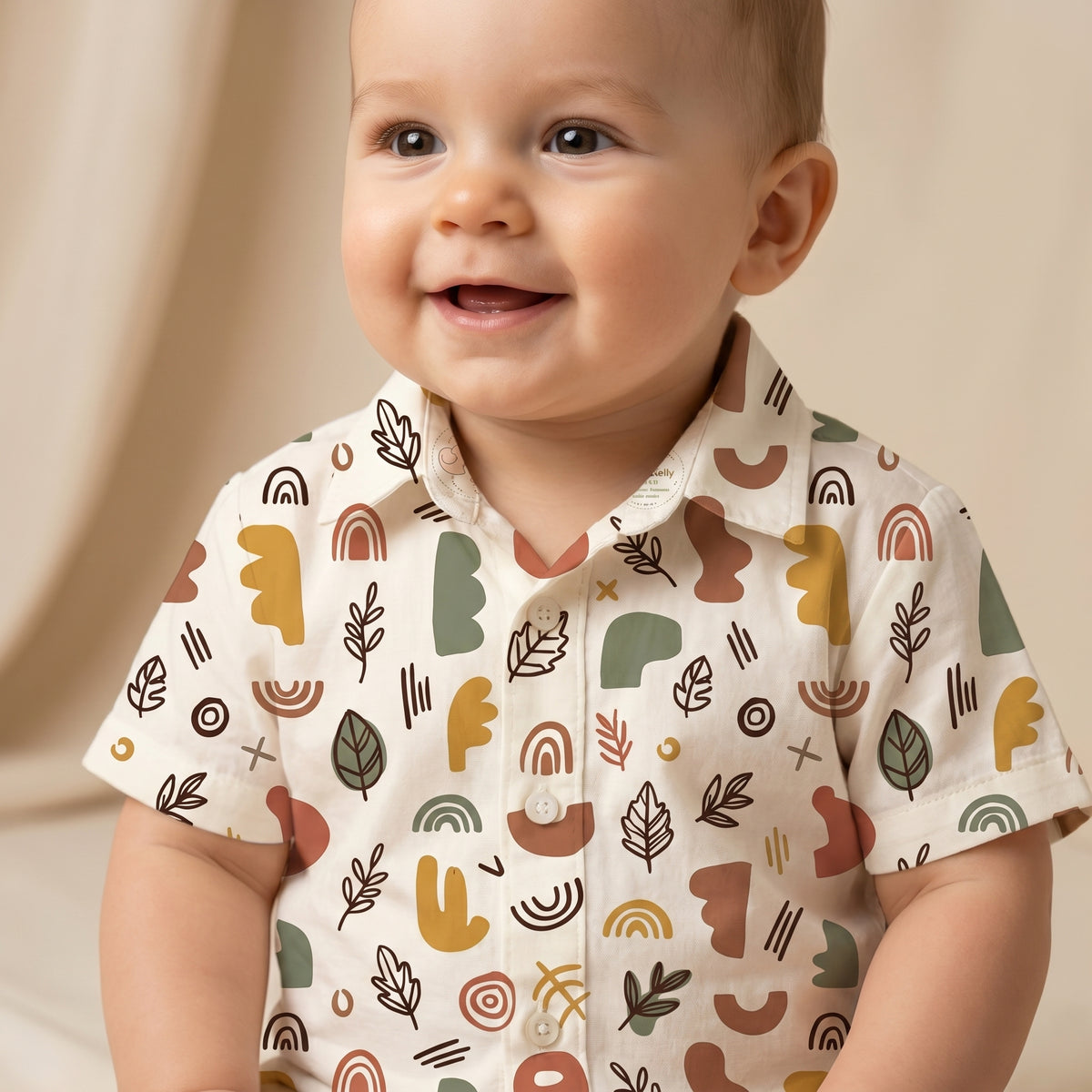 MiniBelly Kids Wear half shirt and pants co-ord set with abstract shapes and leaves in earthy tones, made of soft 100% cotton.