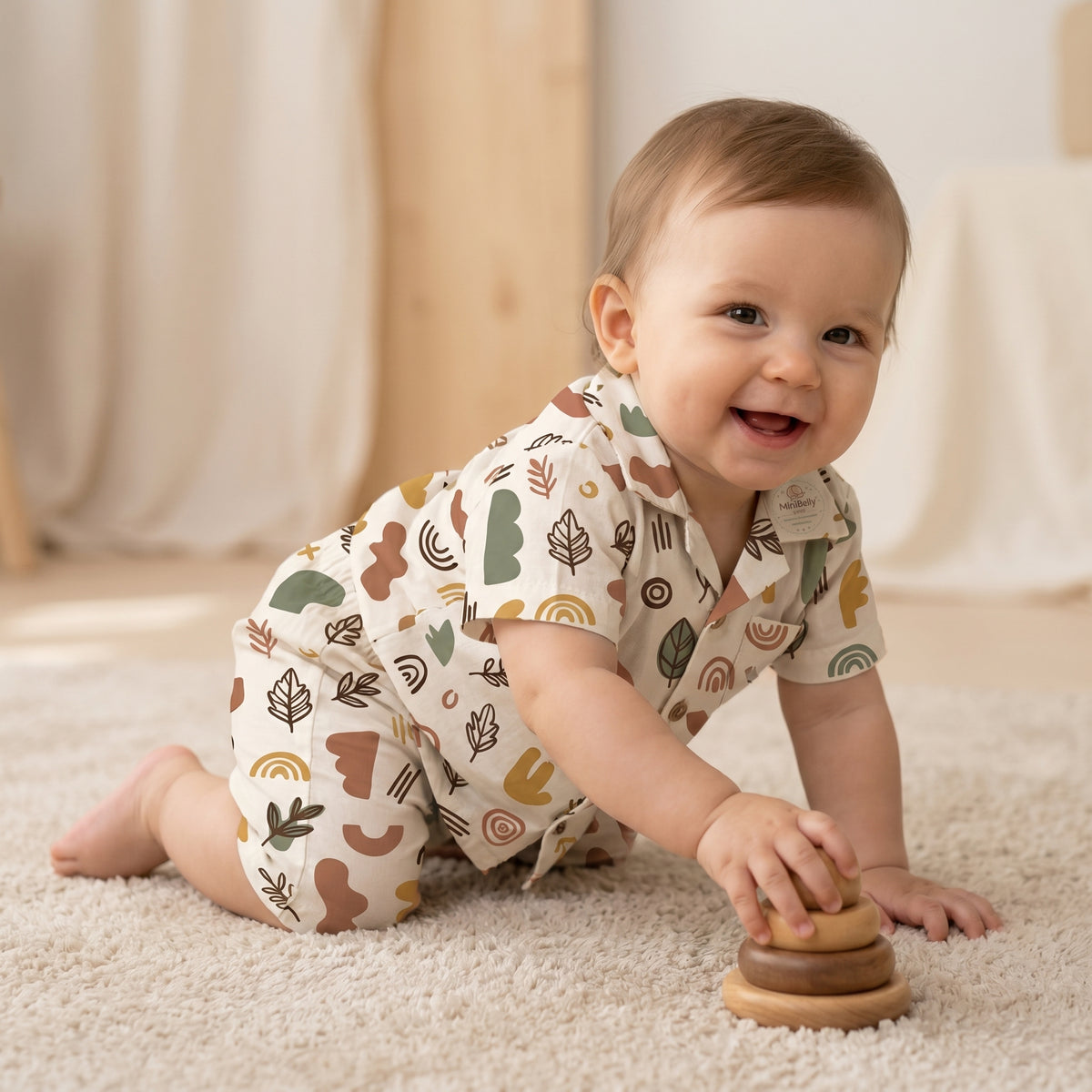 MiniBelly kids' co-ord set with half shirt and pants in abstract shapes and leaves, made of soft 100% cotton in earthy tones.