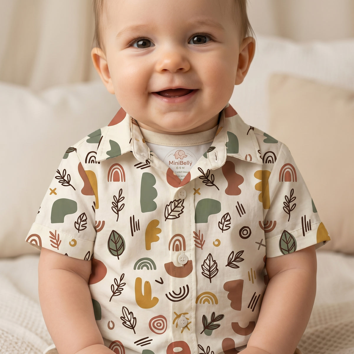 MiniBelly kids' co-ord set with half shirt and pants, featuring abstract shapes and leaves in earthy tones on soft cotton fabric.