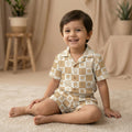 MiniBelly Half Shirt Pant Co-ord Set Cute cartoon giraffe faces on alternating beige and white checkerboard grid 100% Cotton - minibelly