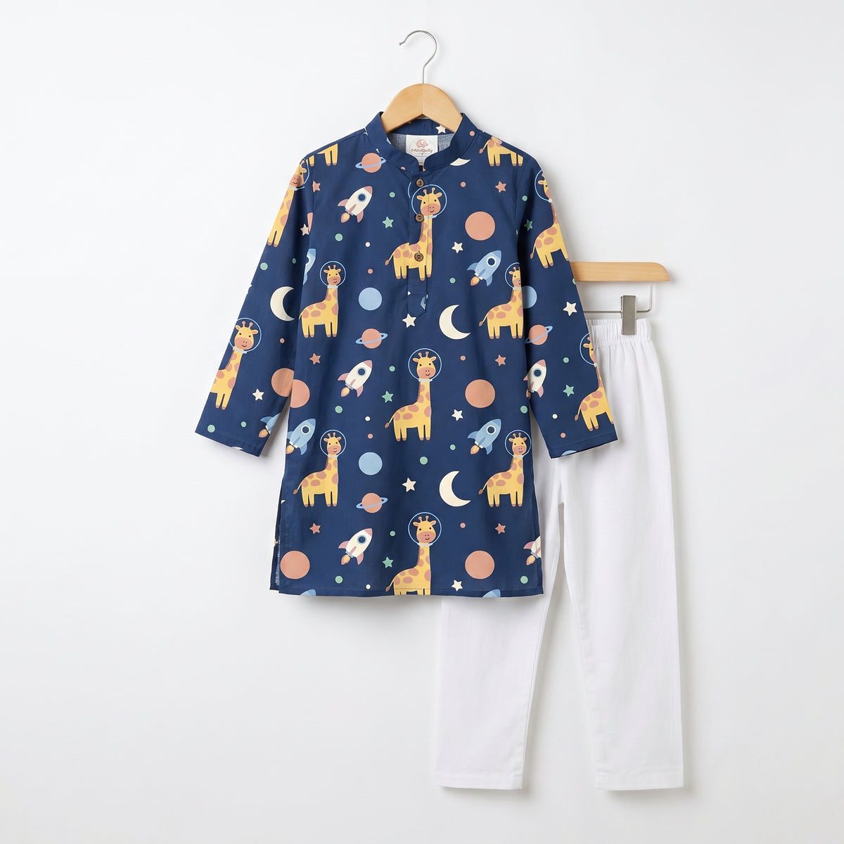 MiniBelly kids' cotton kurta pajama set featuring cute cartoon astronaut giraffes, rockets, and planets in soft cream stripes.