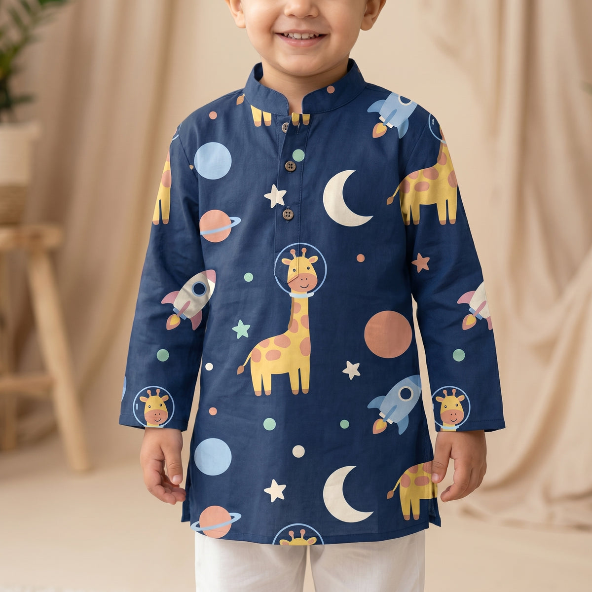 MiniBelly kids' cotton kurta pajama set featuring cute cartoon astronaut giraffes, rockets, and planets in space design.
