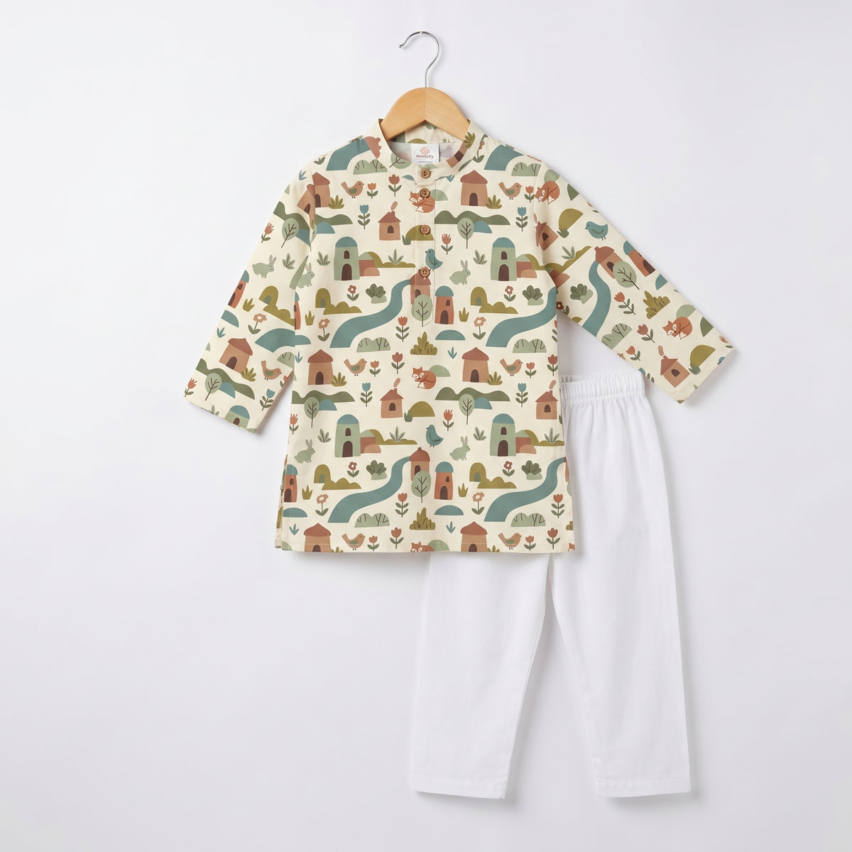 MiniBelly kids' cotton kurta pajama set with soft striped fabric featuring whimsical woodland village with animals and houses.