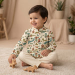 MiniBelly kids' cotton kurta pajama set with whimsical woodland village print featuring animals and houses in soft cream stripes.