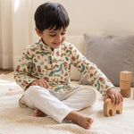 MiniBelly kids' cotton Kurta Pajama set with soft striped fabric featuring whimsical woodland village with animals and houses.