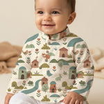 MiniBelly kids' cream cotton kurta pajama set with soft striped fabric featuring whimsical woodland village with animals and houses.