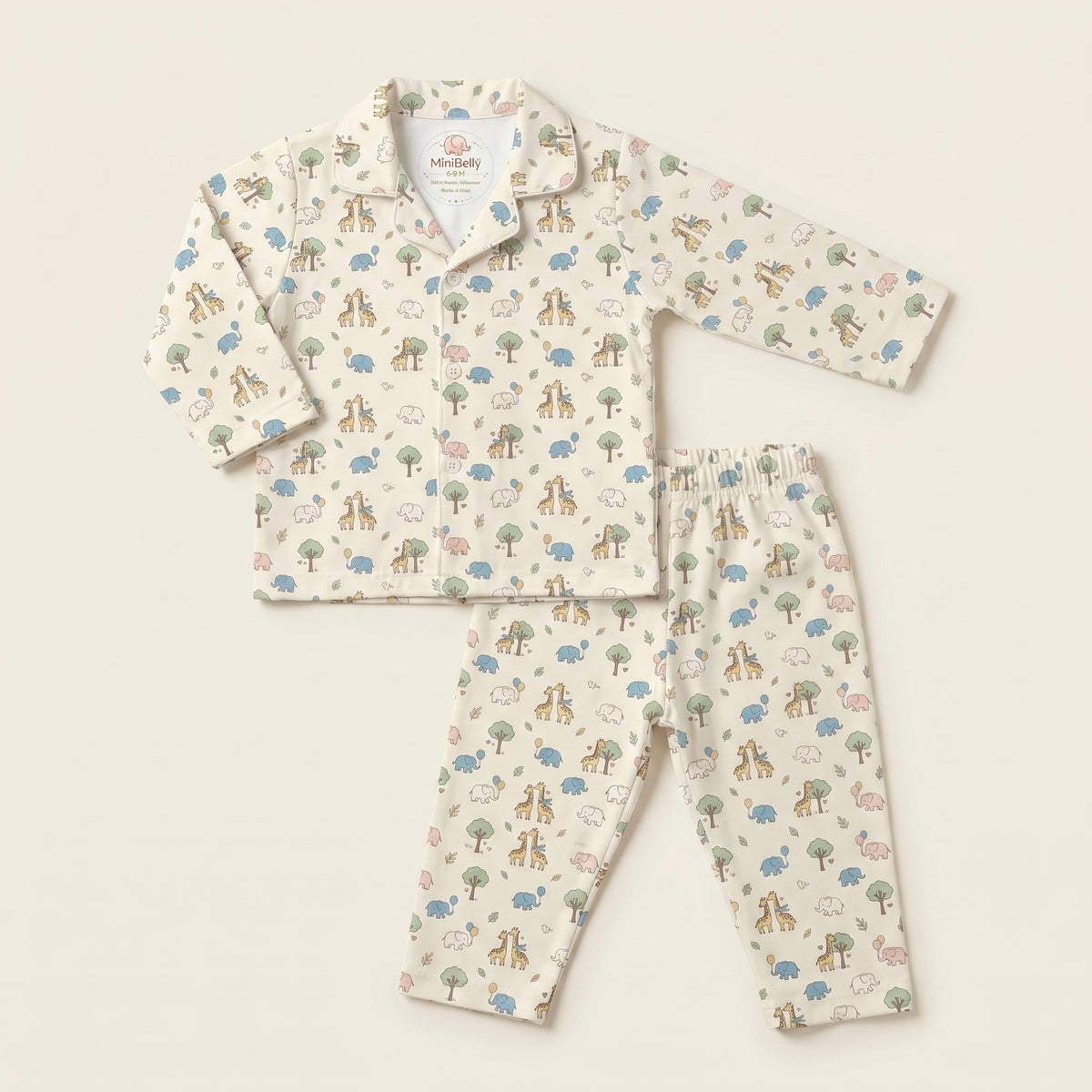 MiniBelly kids' night suit with cute cartoon elephants, giraffes, balloons, and trees on cream cotton fabric for ages 0-6 months