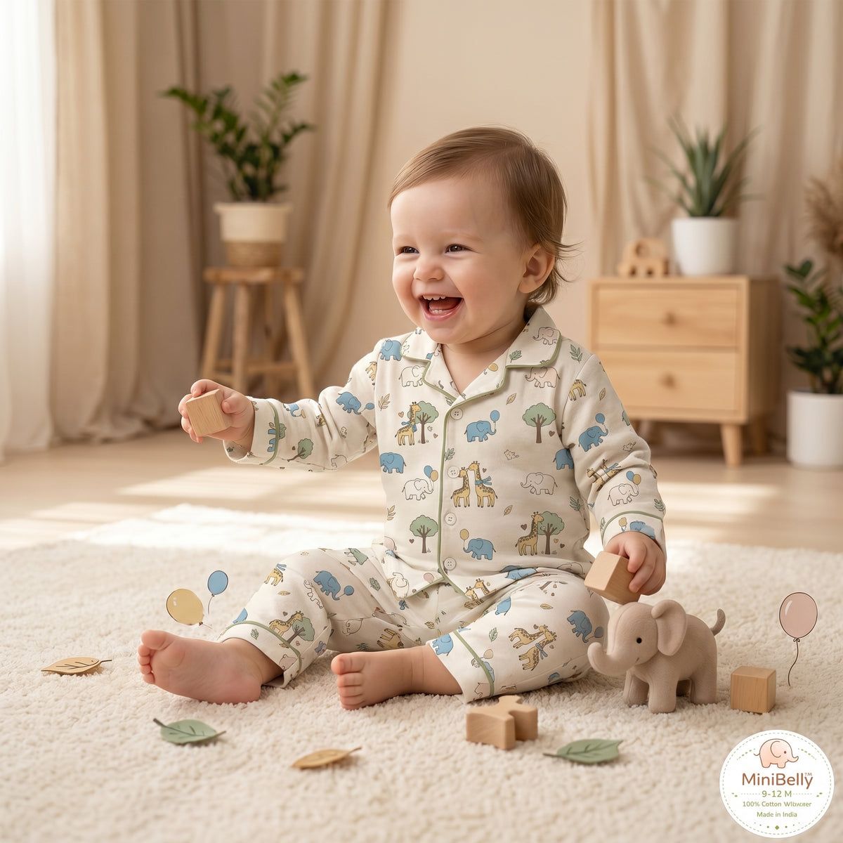 MiniBelly kids night suit with cute cartoon elephants, giraffes, balloons, and trees in 100% cotton for ages 0-6 months.