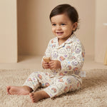 MiniBelly kids' night suit in soft cream with animal, ghost, cloud, and mushroom patterns, made of 100% cotton.