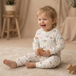 MiniBelly kids' night suit with soft striped cream fabric featuring cute animals, ghosts, clouds, and mushrooms in 100% cotton.